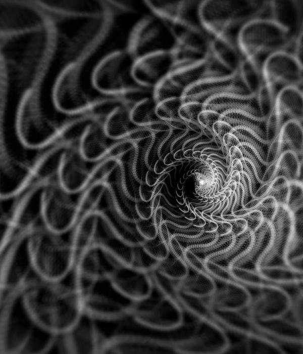A mesmerizing black and white abstract spiral pattern creating a sense of depth and motion.